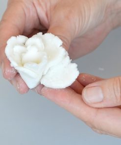 Image of someone moulding cellulose paste
