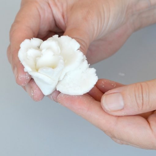 Image of someone moulding cellulose paste
